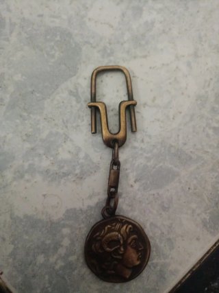 Llavero antiguo con cabeza de hombre