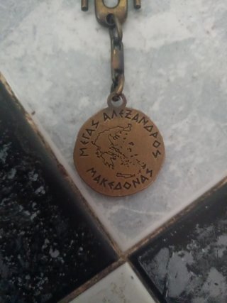 Llavero antiguo con cabeza de hombre