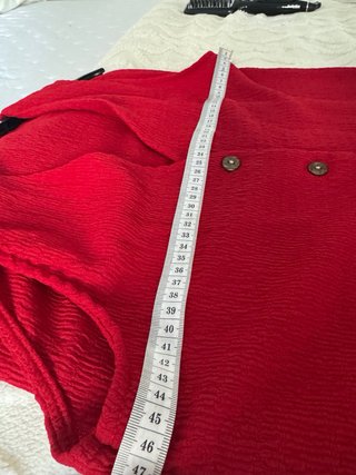 Conjunto chaleco y falda rojo