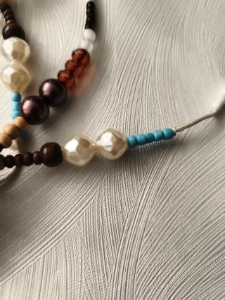 Collar bohochic cuentas en tonos tierra y turquesa