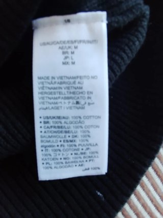 Jersey cuello alto hombre negro