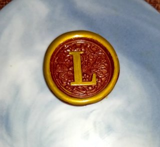 Sello de lacre artesanal letra L