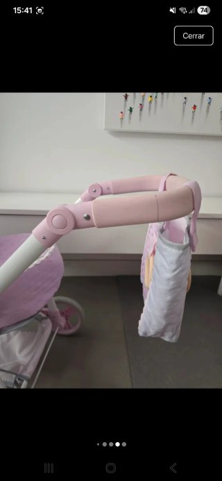 Carro de muñecas rosa
