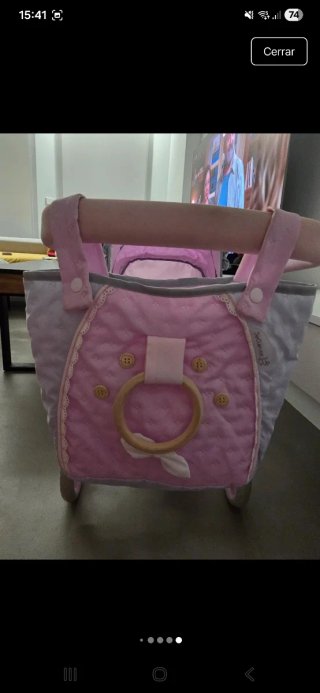 Carro de muñecas rosa