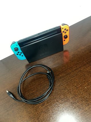 Nintendo Switch + FIFA 24 + Base TV