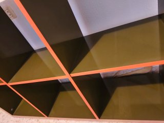 Estantería modular verde y naranja