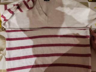 Jersey de mujer con rayas rosas.