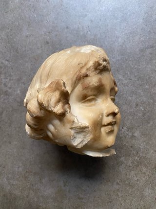 Cabeza antigua de mármol