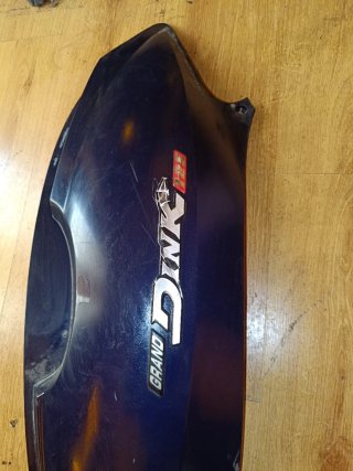 Tapa lateral Kymco Grand Dink 125 (01-14)