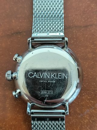 Reloj Calvin Klein plateado y blanco