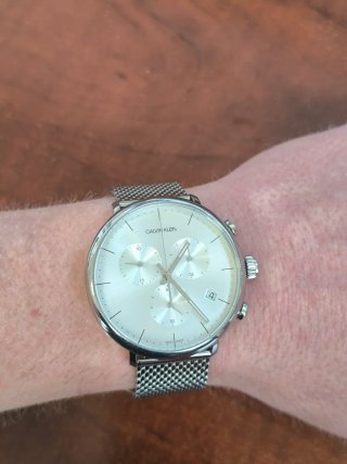 Reloj Calvin Klein plateado y blanco