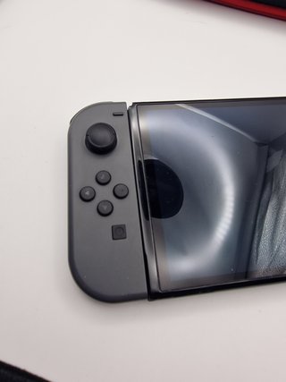 Nintendo Switch OLED 64GB + Caricatore