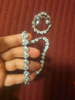 Ariana Grande Corazones Swarovski plateado.