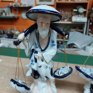 Coppia statuette porcellana vintage pescatori