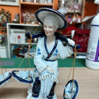 Coppia statuette porcellana vintage pescatori