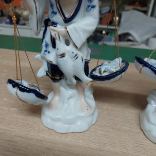 Coppia statuette porcellana vintage pescatori