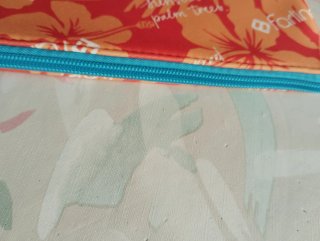 Neceser Farline estampado naranja y rojo