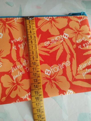 Neceser Farline estampado naranja y rojo