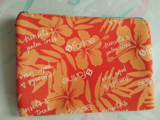 Neceser Farline estampado naranja y rojo