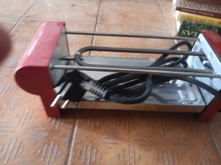 Raclette Roja con Placa Metálica