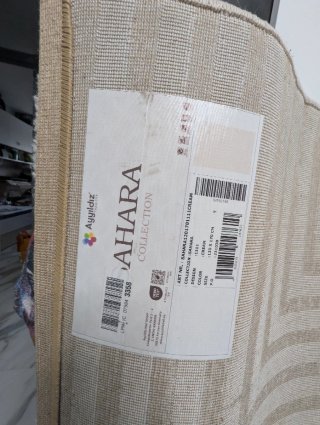 Alfombra beige geométrica