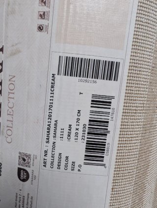 Alfombra beige geométrica