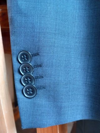 Traje de caballero de cuadros azul Cortefiel.