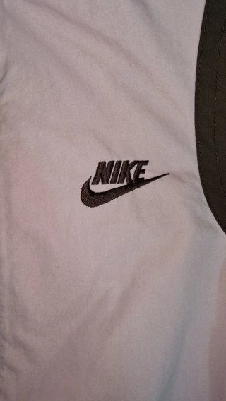 Chaqueta Nike rosa y marrón talla S