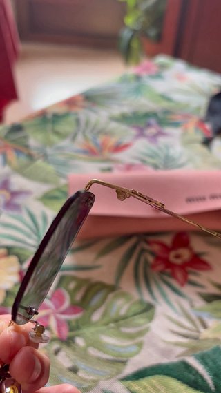 Gafas de sol Miu Miu doradas