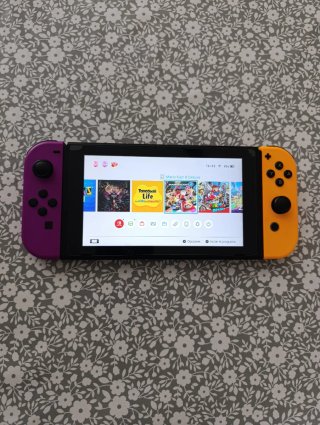 Nintendo Switch Morado y Amarillo