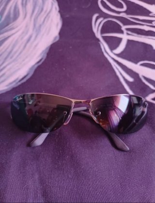 Gafas de sol Ray-Ban negras y verdes