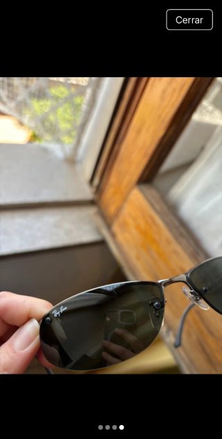 Gafas de sol Ray-Ban negras y verdes