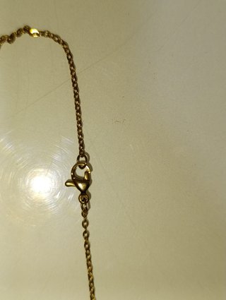 Collana dorata con ciondoli Elefante e Civetta