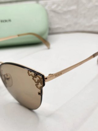 Gafas de sol Tous doradas y marrones