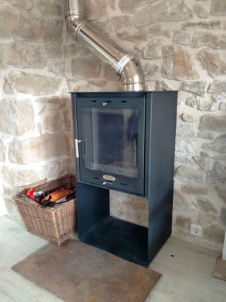 Estufa Leña Ibiza 14,3 kW con Leñero