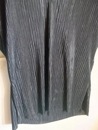 Blusa negra brillante