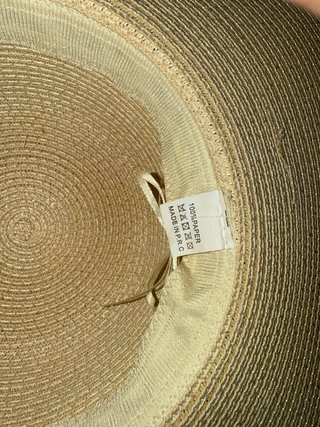 Sombrero de paja beige con lazo negro