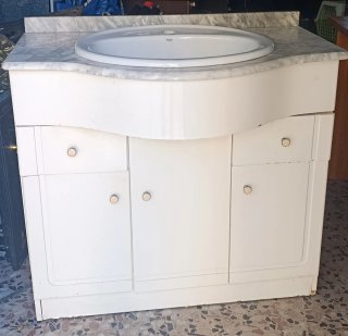 Mueble de baño con lavabo de mármol