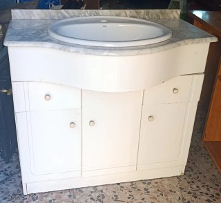 Mueble de baño con lavabo de mármol