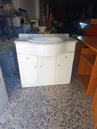 Mueble de baño con lavabo de mármol