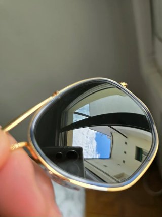 Gafas de sol Ray-Ban verdes y doradas