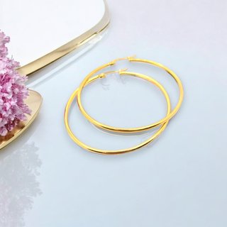 Aros 5 cm. diámetro plateados o dorados de acero.