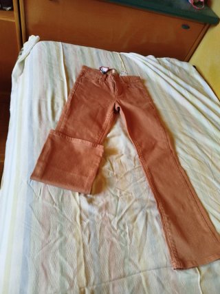 Pantalones vaqueros niña naranja Talla M
