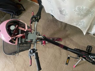 Bicicleta Btwin rosa con cesta