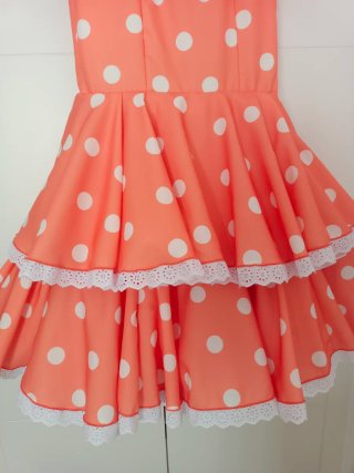 Traje de flamenca naranja.
