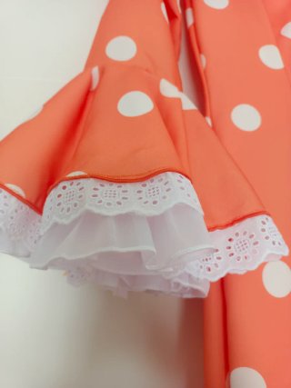 Traje de flamenca naranja.