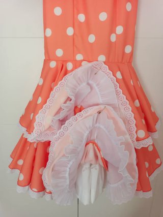 Traje de flamenca naranja.