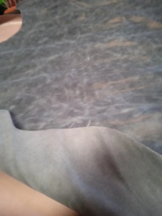 Piel genuina color  azul humo. 16€.