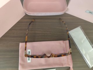 Occhiali da sole Miu Miu tartarugati con Lenti Ros