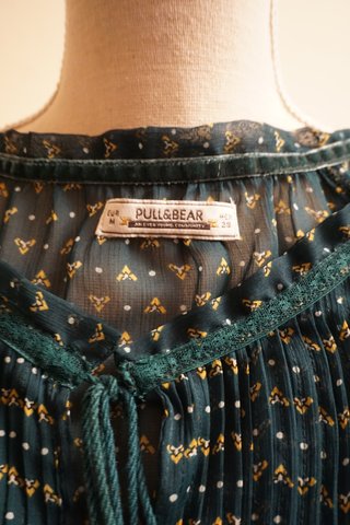 Blusa verde transparente con estampado
